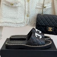 Chanel Slides with Pearls Logo and Woven Chain Women in Quilted Calfskin Black